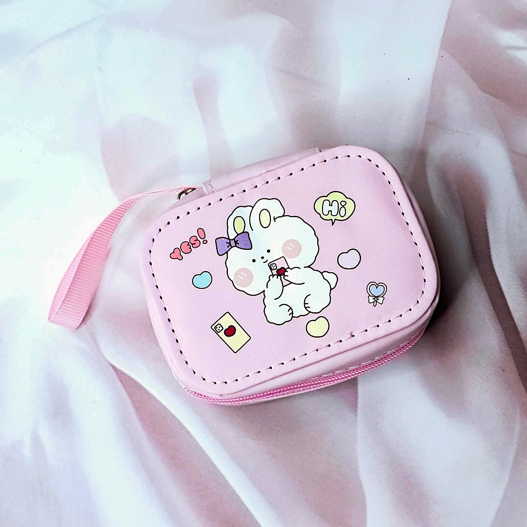 Various cartoon-themed small storage pouches for kids, featuring bunnies, chicks, and other fun designs. www.usmile.toys